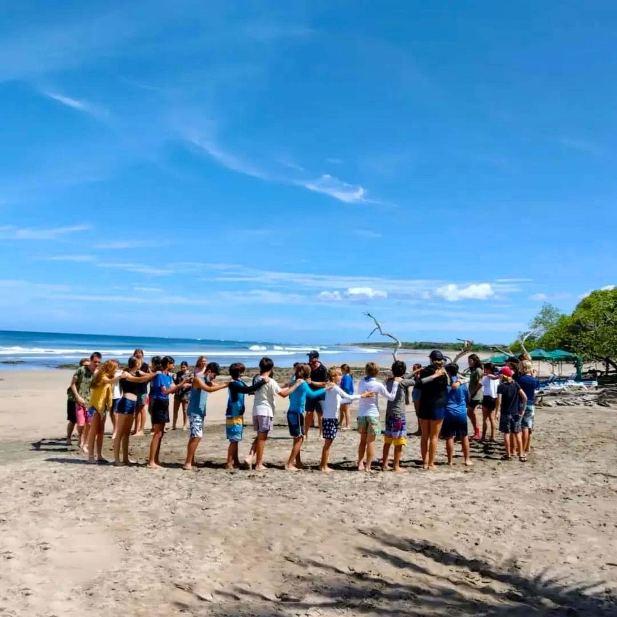 Students gathered on beach