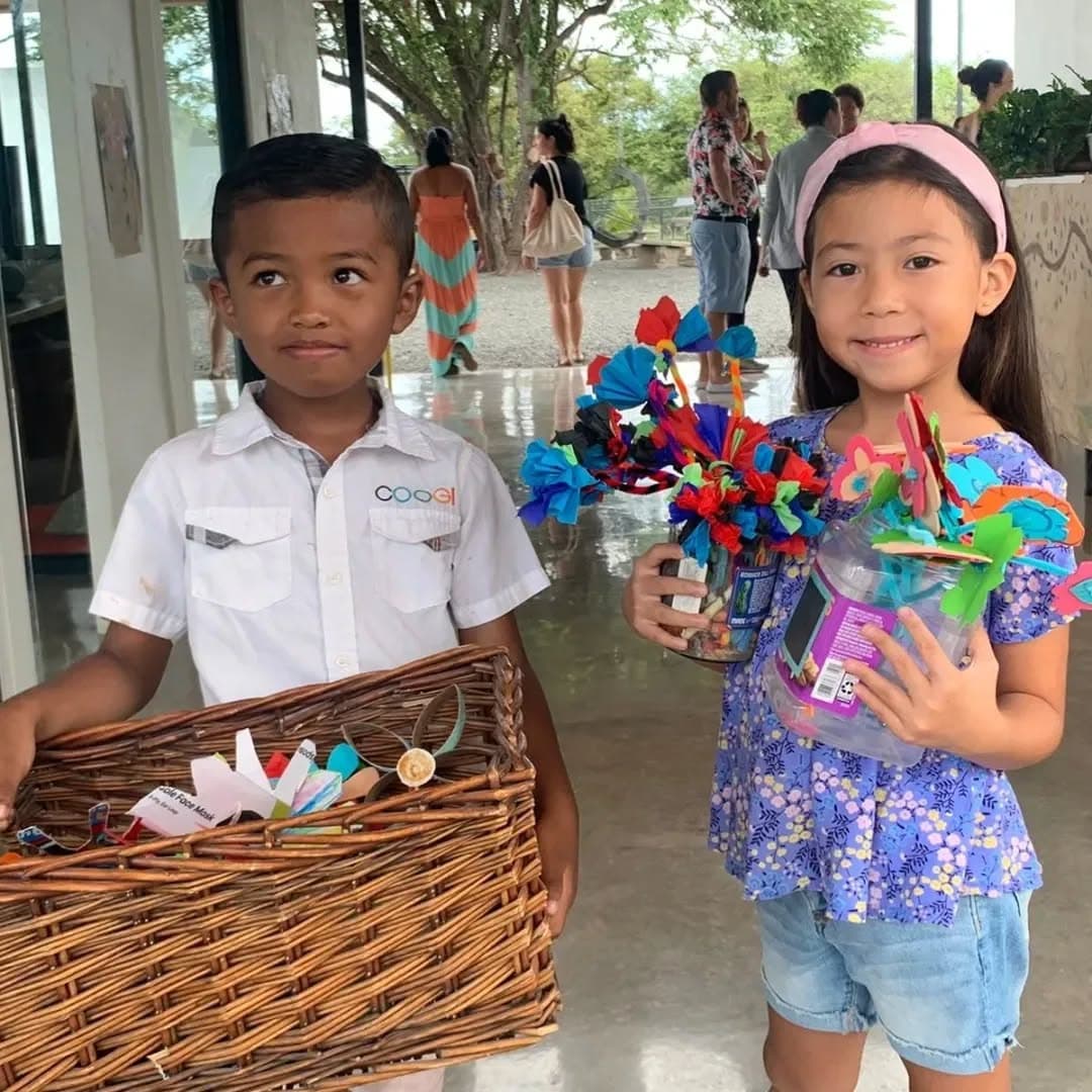 Elementary students with baskets